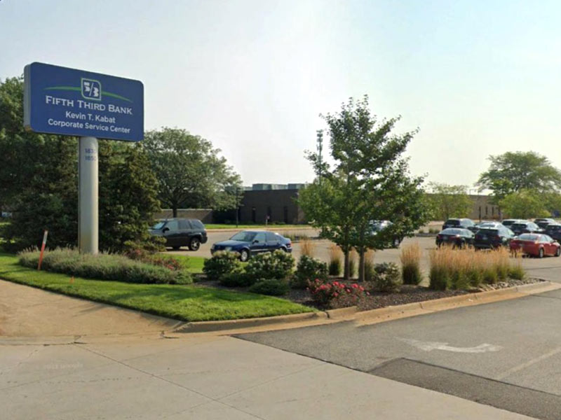 Photo of brilar tended landscaping with flowers and hedges for Fifth Third Bank